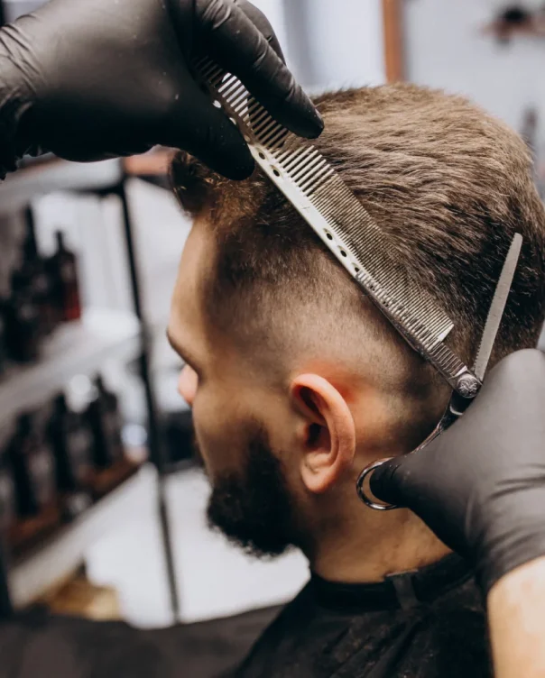 client-doing-hair-cut-barber-shop-salon