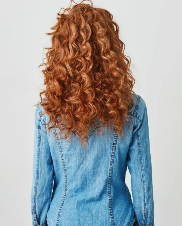 photo-girl-with-red-curly-hair-standing